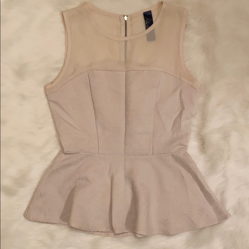 Sleeveless peplum top